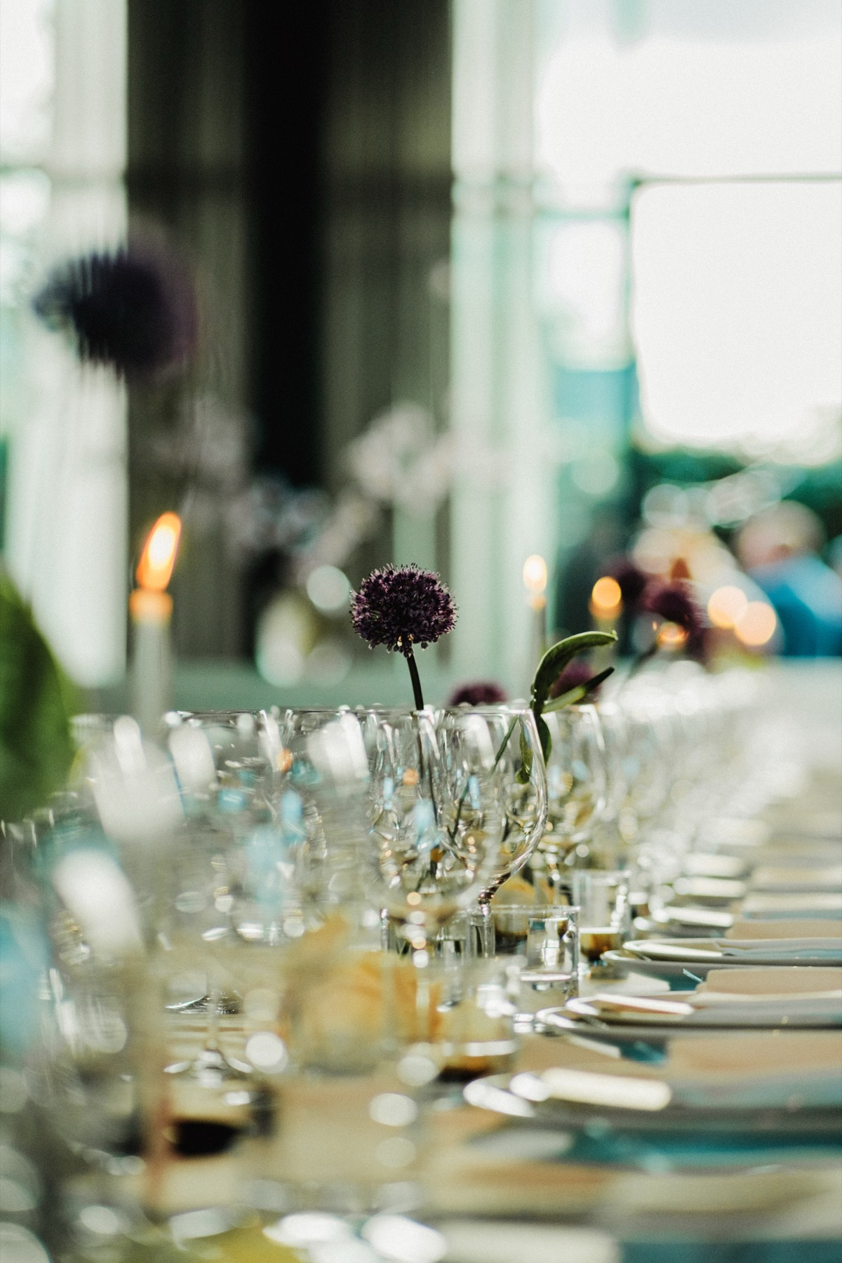Glassware and flowers on the table at a dinner we catered