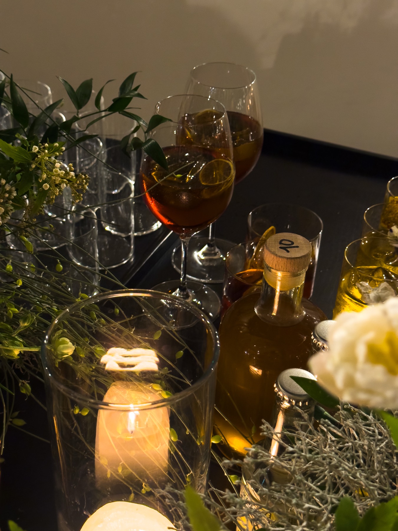 Table with florals and candlelight, styled by our team at an Amsterdam event